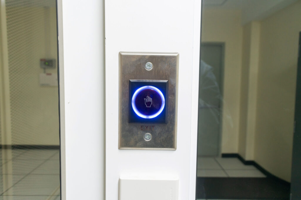 Modern Touchless Door Control Panel with Illuminated Access Button