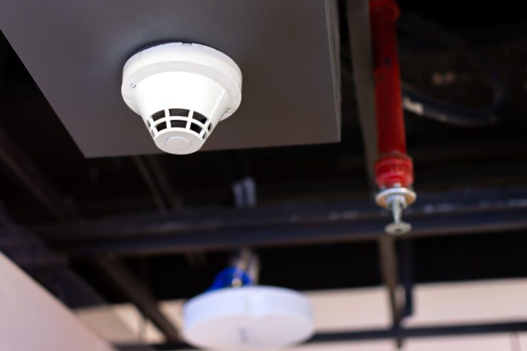 Security Camera on Building Monitoring Outdoor Area